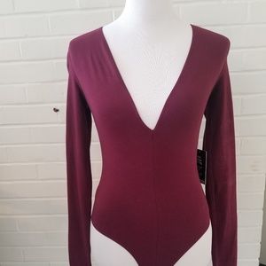 Express deep v bodysuit. NWT